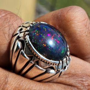 Absolutely stunning natural black opal in Handmade Sterling Silver Ring